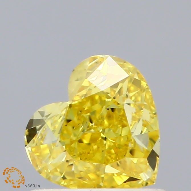 Loose Diamond - HEART 0.74ct Fancy Vivid Yellow VVS2: Loose Diamond - HEART 0.74ct Fancy Vivid Yellow VVS2 Source: This is a real non-mined Diamond that has been grown in a lab Shape: HEART Carats: 0.74 Color: Fancy Vivid Yellow Certification: IGI Video: