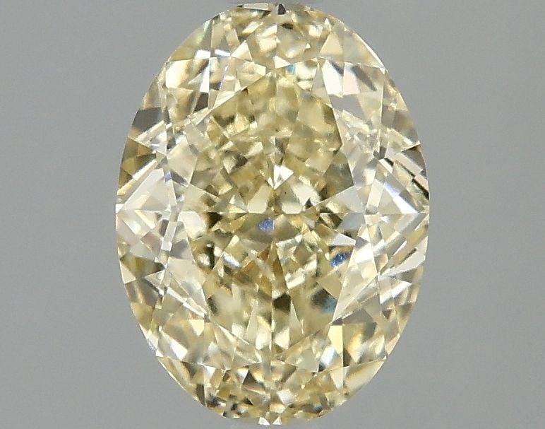 Loose Diamond - OVAL 2.1ct Fancy Intense Yellow VS1: Loose Diamond - OVAL 2.1ct Fancy Intense Yellow VS1 Source: This is a real non-mined Diamond that has been grown in a lab Shape: OVAL Carats: 2.1 Color: Fancy Intense Yellow Certification: IGI Video: