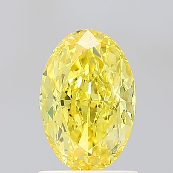 Loose Diamond - OVAL 1.37ct Fancy Vivid Yellow VS1: Loose Diamond - OVAL 1.37ct Fancy Vivid Yellow VS1 Source: This is a real non-mined Diamond that has been grown in a lab Shape: OVAL Carats: 1.37 Color: Fancy Vivid Yellow Certification: IGI Video: