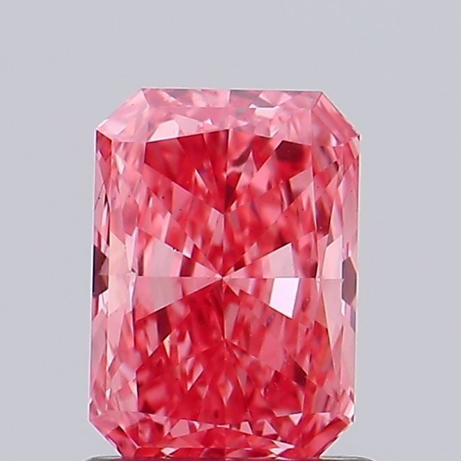 Loose Diamond - RADIANT 0.86ct Fancy Vivid Pink VS1: Loose Diamond - RADIANT 0.86ct Fancy Vivid Pink VS1 Source: This is a real non-mined Diamond that has been grown in a lab Shape: RADIANT Carats: 0.86 Color: Fancy Vivid Pink Certification: IGI Video:
