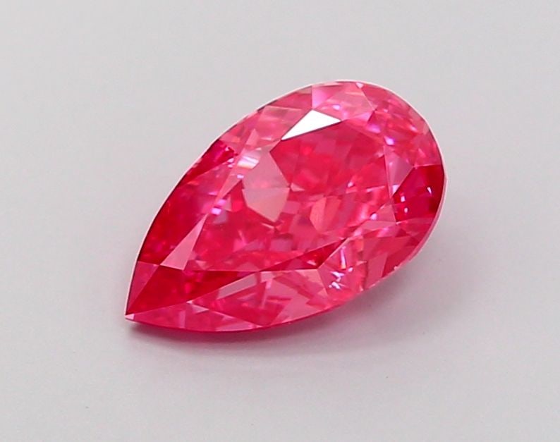 Loose Diamond - PEAR 1.52ct Fancy Vivid Pink VS1: Loose Diamond - PEAR 1.52ct Fancy Vivid Pink VS1 Source: This is a real non-mined Diamond that has been grown in a lab Shape: PEAR Carats: 1.52 Color: Fancy Vivid Pink Certification: IGI Video: