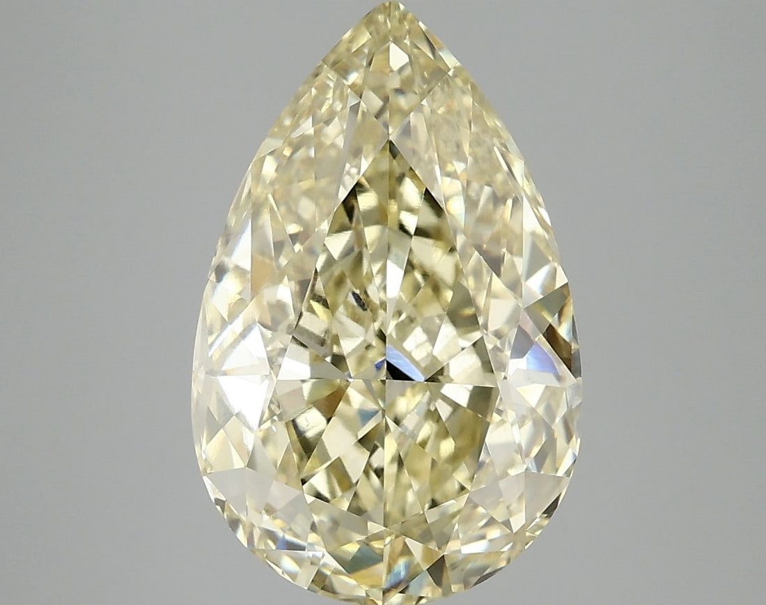 Loose Diamond - PEAR 5.08ct Fancy Vivid Yellow VS2: Loose Diamond - PEAR 5.08ct Fancy Vivid Yellow VS2 Source: This is a real non-mined Diamond that has been grown in a lab Shape: PEAR Carats: 5.08 Color: Fancy Vivid Yellow Certification: IGI Video:
