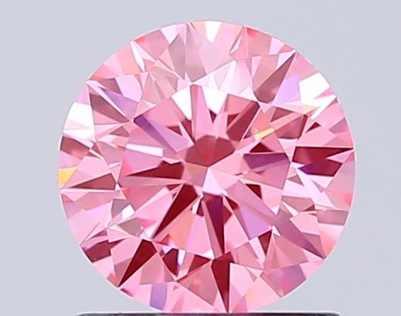 Ideal Loose Diamond - ROUND 1.07ct Fancy Vivid Pink VS1: Ideal Loose Diamond - ROUND 1.07ct Fancy Vivid Pink VS1 Source: This is a real non-mined Diamond that has been grown in a lab Shape: ROUND Carats: 1.07 Color: Fancy Vivid Pink Certification: IGI