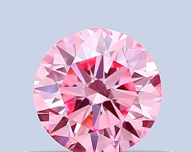 Loose Diamond - ROUND 0.5ct Fancy Vivid Pink SI1: Loose Diamond - ROUND 0.5ct Fancy Vivid Pink SI1 Source: This is a real non-mined Diamond that has been grown in a lab Shape: ROUND Carats: 0.5 Color: Fancy Vivid Pink Certification: IGI Video: