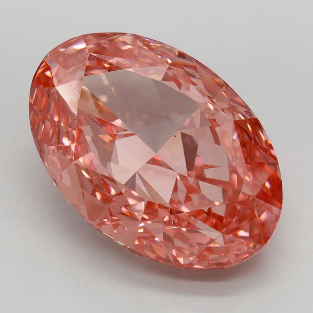 Loose Diamond - OVAL 6.2ct Fancy Vivid Pink VS1: Loose Diamond - OVAL 6.2ct Fancy Vivid Pink VS1 Source: This is a real non-mined Diamond that has been grown in a lab Shape: OVAL Carats: 6.2 Color: Fancy Vivid Pink Certification: IGI Video:
