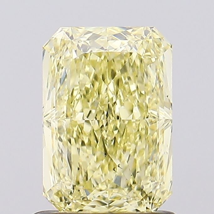Loose Diamond - RADIANT 1.11ct Fancy Yellow VS2: Loose Diamond - RADIANT 1.11ct Fancy Yellow VS2 Source: This is a real non-mined Diamond that has been grown in a lab Shape: RADIANT Carats: 1.11 Color: Fancy Yellow Certification: IGI Video: