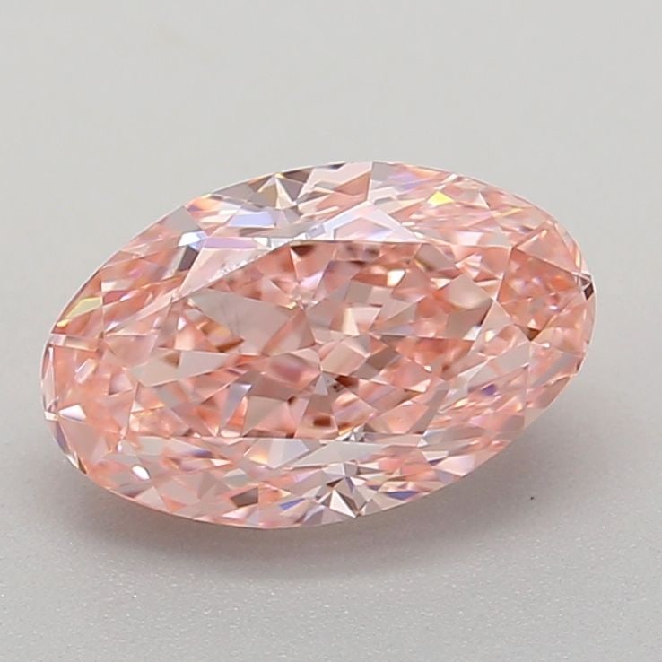 Loose Diamond - OVAL 0.95ct Fancy Vivid Pink VS1: Loose Diamond - OVAL 0.95ct Fancy Vivid Pink VS1 Source: This is a real non-mined Diamond that has been grown in a lab Shape: OVAL Carats: 0.95 Color: Fancy Vivid Pink Certification: IGI Video: