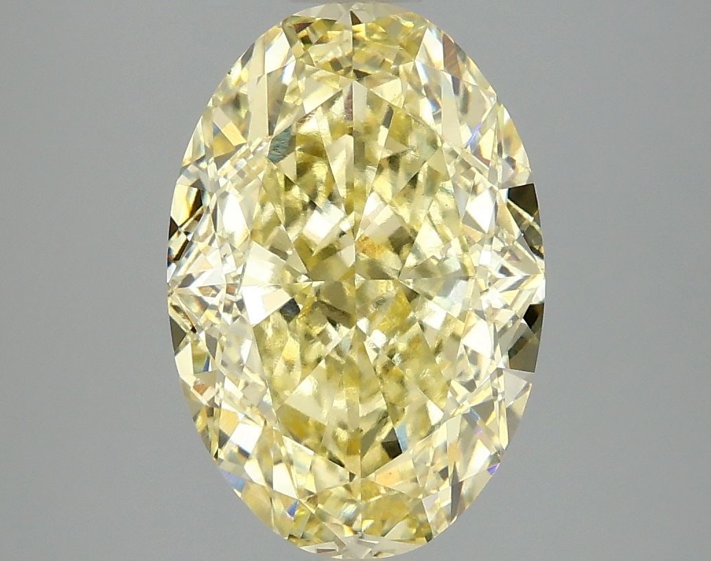 Loose Diamond - OVAL 4.05ct Fancy Vivid Yellow VS1: Loose Diamond - OVAL 4.05ct Fancy Vivid Yellow VS1 Source: This is a real non-mined Diamond that has been grown in a lab Shape: OVAL Carats: 4.05 Color: Fancy Vivid Yellow Certification: IGI Video: