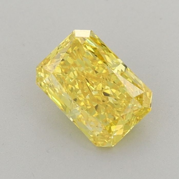 Loose Diamond - RADIANT 0.76ct Fancy Vivid Yellow VS2: Loose Diamond - RADIANT 0.76ct Fancy Vivid Yellow VS2 Source: This is a real non-mined Diamond that has been grown in a lab Shape: RADIANT Carats: 0.76 Color: Fancy Vivid Yellow Certification: IGI Vid