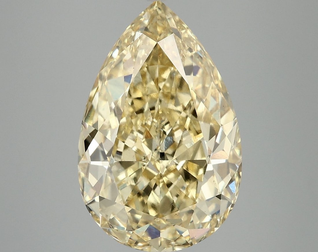 Loose Diamond - PEAR 7.13ct Fancy Vivid Yellow VS2: Loose Diamond - PEAR 7.13ct Fancy Vivid Yellow VS2 Source: This is a real non-mined Diamond that has been grown in a lab Shape: PEAR Carats: 7.13 Color: Fancy Vivid Yellow Certification: IGI Video: