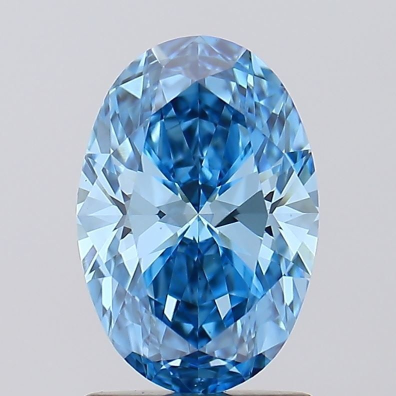 Loose Diamond - OVAL 1.28ct Fancy Vivid Blue VS1: Loose Diamond - OVAL 1.28ct Fancy Vivid Blue VS1 Source: This is a real non-mined Diamond that has been grown in a lab Shape: OVAL Carats: 1.28 Color: Fancy Vivid Blue Certification: IGI Video: