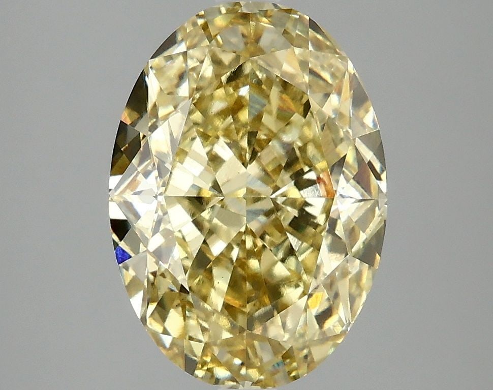 Loose Diamond - OVAL 4.1ct Fancy Vivid Yellow VS1: Loose Diamond - OVAL 4.1ct Fancy Vivid Yellow VS1 Source: This is a real non-mined Diamond that has been grown in a lab Shape: OVAL Carats: 4.1 Color: Fancy Vivid Yellow Certification: IGI Video: