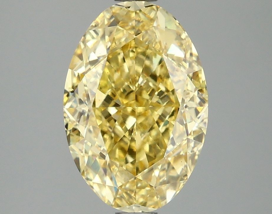 Loose Diamond - OVAL 3.04ct Fancy Vivid Yellow VS1: Loose Diamond - OVAL 3.04ct Fancy Vivid Yellow VS1 Source: This is a real non-mined Diamond that has been grown in a lab Shape: OVAL Carats: 3.04 Color: Fancy Vivid Yellow Certification: IGI Video: