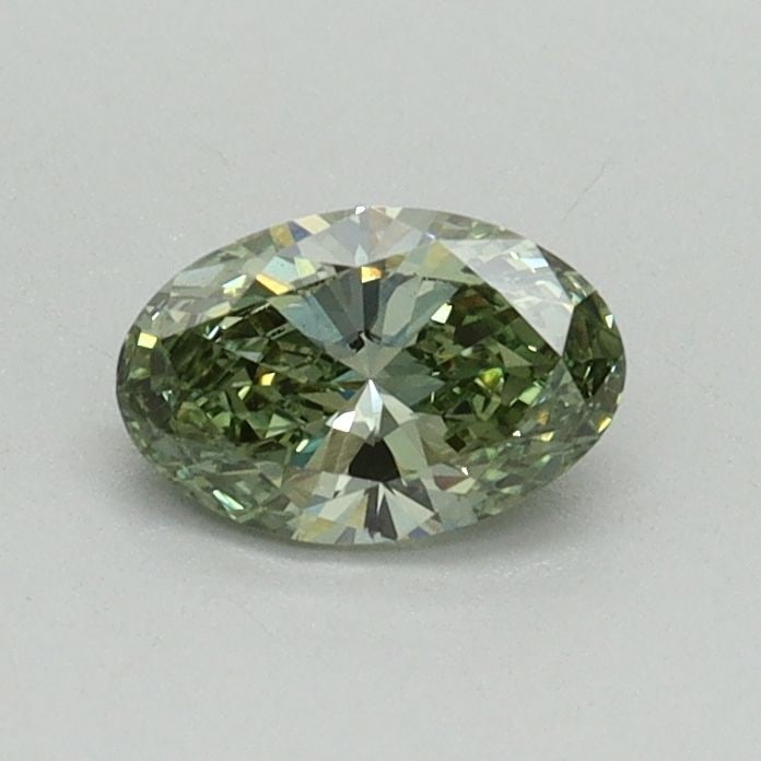 Loose Diamond - OVAL 0.43ct Fancy Vivid Green VS1: Loose Diamond - OVAL 0.43ct Fancy Vivid Green VS1 Source: This is a real non-mined Diamond that has been grown in a lab Shape: OVAL Carats: 0.43 Color: Fancy Vivid Green Certification: IGI Video: