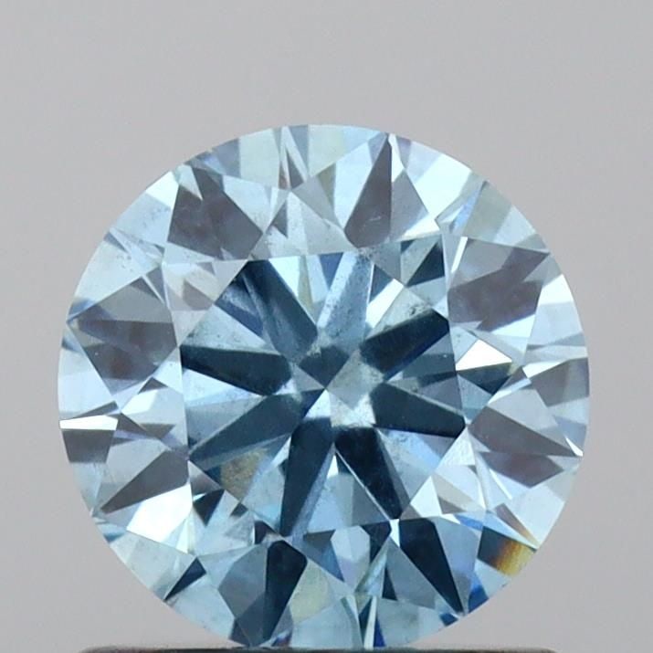Ideal Loose Diamond - ROUND 0.95ct Fancy Vivid Blue SI2: Ideal Loose Diamond - ROUND 0.95ct Fancy Vivid Blue SI2 Source: This is a real non-mined Diamond that has been grown in a lab Shape: ROUND Carats: 0.95 Color: Fancy Vivid Blue Certification: IGI Video