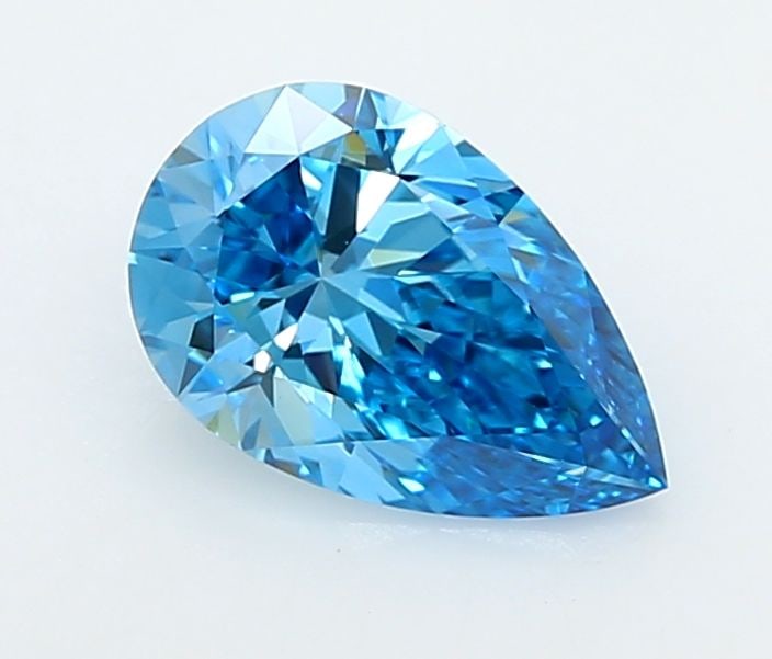 Loose Diamond - PEAR 1.28ct Fancy Vivid Blue VVS2: Loose Diamond - PEAR 1.28ct Fancy Vivid Blue VVS2 Source: This is a real non-mined Diamond that has been grown in a lab Shape: PEAR Carats: 1.28 Color: Fancy Vivid Blue Certification: IGI Video: