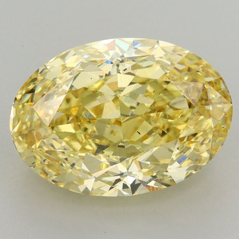 Loose Diamond - OVAL 5.5ct Fancy Vivid Yellow VS2: Loose Diamond - OVAL 5.5ct Fancy Vivid Yellow VS2 Source: This is a real non-mined Diamond that has been grown in a lab Shape: OVAL Carats: 5.5 Color: Fancy Vivid Yellow Certification: IGI Video: