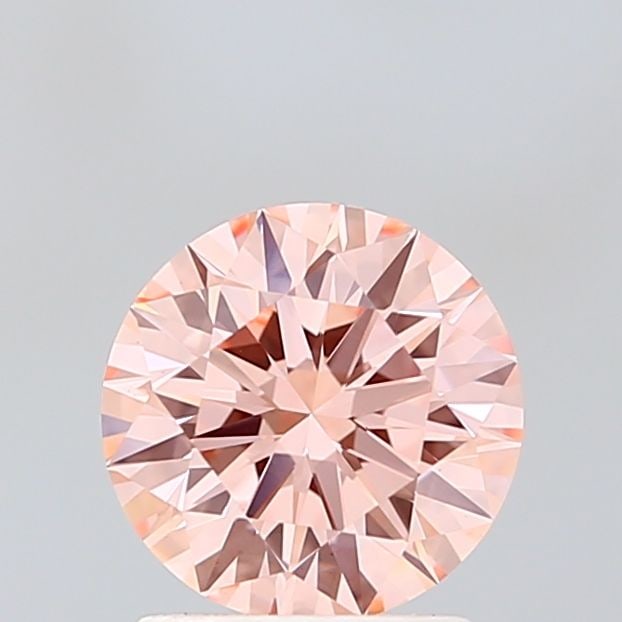 Ideal Loose Diamond - ROUND 1.55ct Fancy Vivid Pink VS1: Ideal Loose Diamond - ROUND 1.55ct Fancy Vivid Pink VS1 Source: This is a real non-mined Diamond that has been grown in a lab Shape: ROUND Carats: 1.55 Color: Fancy Vivid Pink Certification: IGI Video
