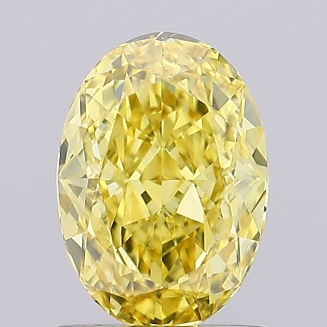 Loose Diamond - OVAL 1.09ct Fancy Vivid Yellow VS1: Loose Diamond - OVAL 1.09ct Fancy Vivid Yellow VS1 Source: This is a real non-mined Diamond that has been grown in a lab Shape: OVAL Carats: 1.09 Color: Fancy Vivid Yellow Certification: IGI Video: