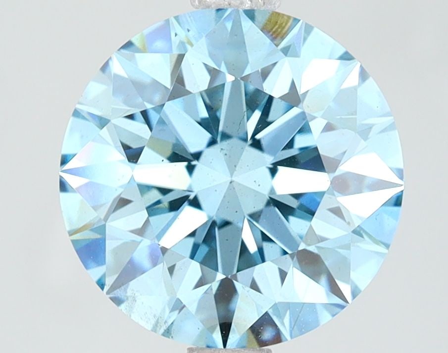Loose Diamond - ROUND 3.01ct Fancy Vivid Blue VS2: Loose Diamond - ROUND 3.01ct Fancy Vivid Blue VS2 Source: This is a real non-mined Diamond that has been grown in a lab Shape: ROUND Carats: 3.01 Color: Fancy Vivid Blue Certification: NONE Video:
