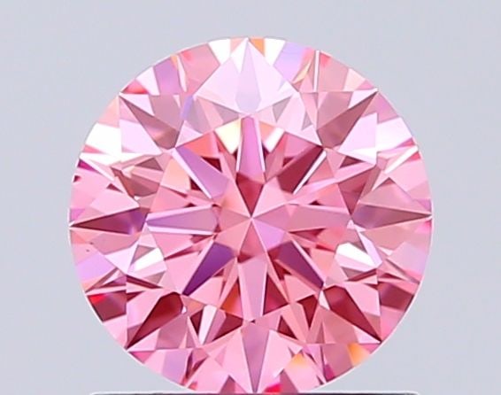 Ideal Loose Diamond - ROUND 1.01ct Fancy Vivid Pink VS2: Ideal Loose Diamond - ROUND 1.01ct Fancy Vivid Pink VS2 Source: This is a real non-mined Diamond that has been grown in a lab Shape: ROUND Carats: 1.01 Color: Fancy Vivid Pink Certification: IGI Video