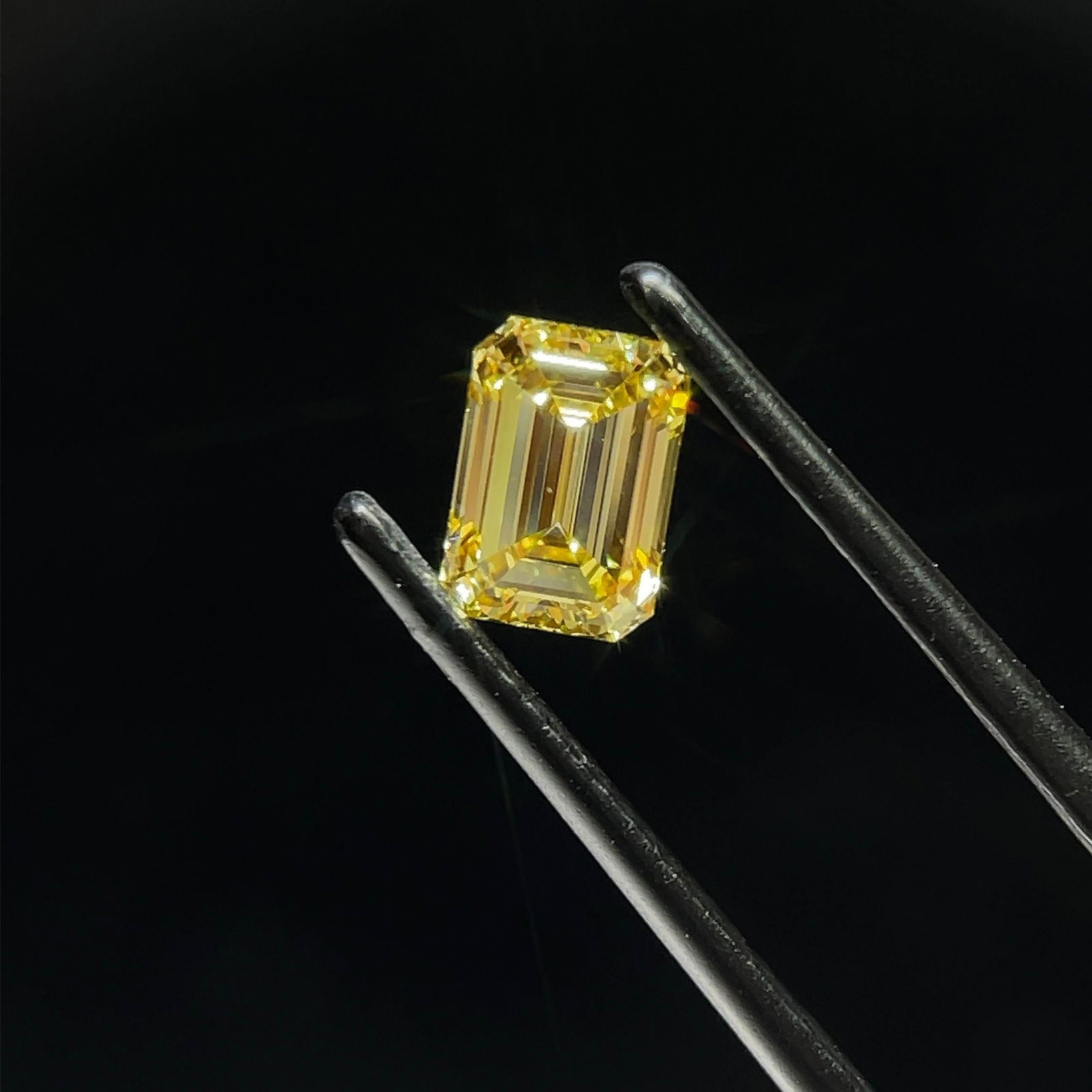Loose Diamond - EMERALD 0.96ct Fancy Intense Yellow VS1: Loose Diamond - EMERALD 0.96ct Fancy Intense Yellow VS1 Source: This is a real non-mined Diamond that has been grown in a lab Shape: EMERALD Carats: 0.96 Color: Fancy Intense Yellow Certification: IGI