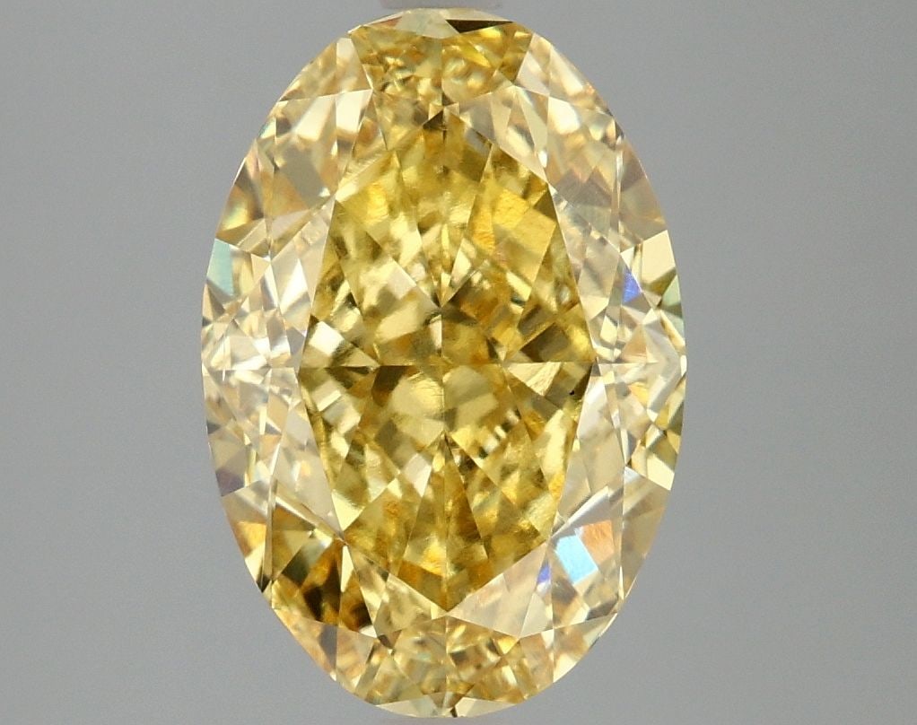 Loose Diamond - OVAL 4.05ct Fancy Vivid Yellow VS2: Loose Diamond - OVAL 4.05ct Fancy Vivid Yellow VS2 Source: This is a real non-mined Diamond that has been grown in a lab Shape: OVAL Carats: 4.05 Color: Fancy Vivid Yellow Certification: IGI Video: