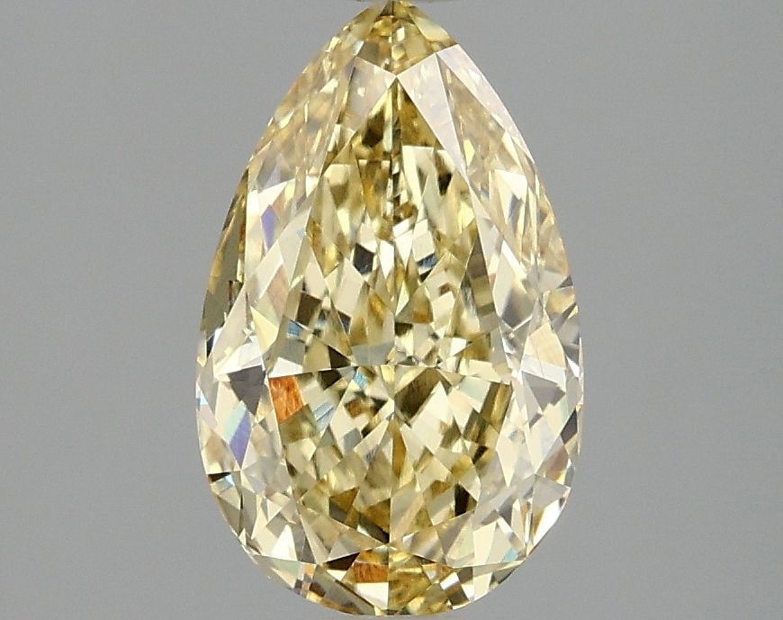 Loose Diamond - PEAR 1.97ct Fancy Vivid Yellow VS1: Loose Diamond - PEAR 1.97ct Fancy Vivid Yellow VS1 Source: This is a real non-mined Diamond that has been grown in a lab Shape: PEAR Carats: 1.97 Color: Fancy Vivid Yellow Certification: IGI Video: