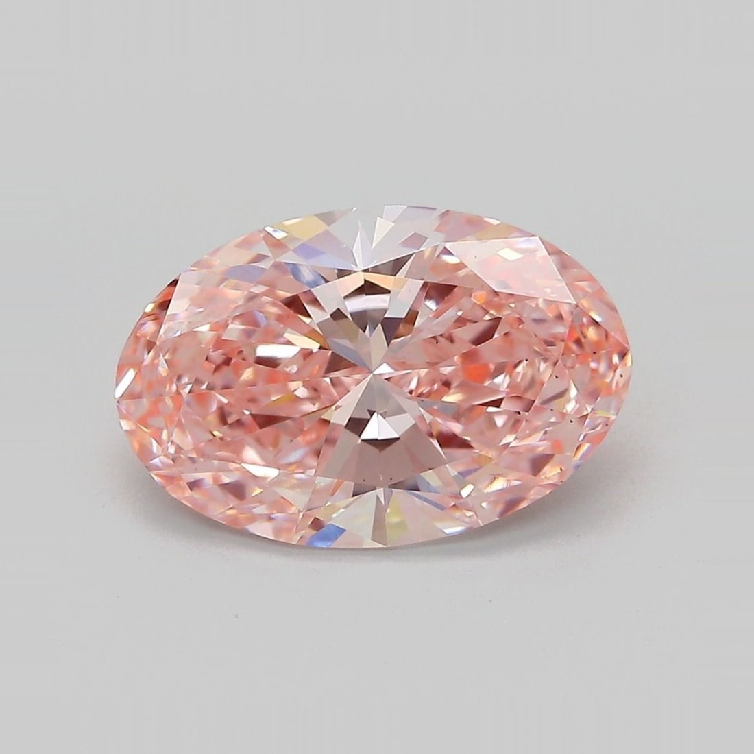 Loose Diamond - OVAL 3.89ct Fancy Vivid Pink VS2: Loose Diamond - OVAL 3.89ct Fancy Vivid Pink VS2 Source: This is a real non-mined Diamond that has been grown in a lab Shape: OVAL Carats: 3.89 Color: Fancy Vivid Pink Certification: IGI Video: