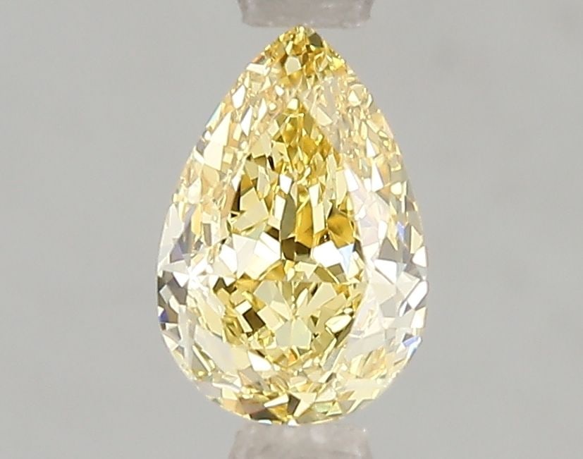 Loose Diamond - PEAR 1.1ct Fancy Vivid Yellow VS1: Loose Diamond - PEAR 1.1ct Fancy Vivid Yellow VS1 Source: This is a real non-mined Diamond that has been grown in a lab Shape: PEAR Carats: 1.1 Color: Fancy Vivid Yellow Certification: IGI Video: