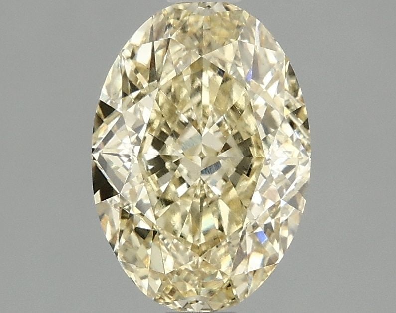 Loose Diamond - OVAL 2.06ct Fancy Vivid Yellow VS1: Loose Diamond - OVAL 2.06ct Fancy Vivid Yellow VS1 Source: This is a real non-mined Diamond that has been grown in a lab Shape: OVAL Carats: 2.06 Color: Fancy Vivid Yellow Certification: IGI Video: