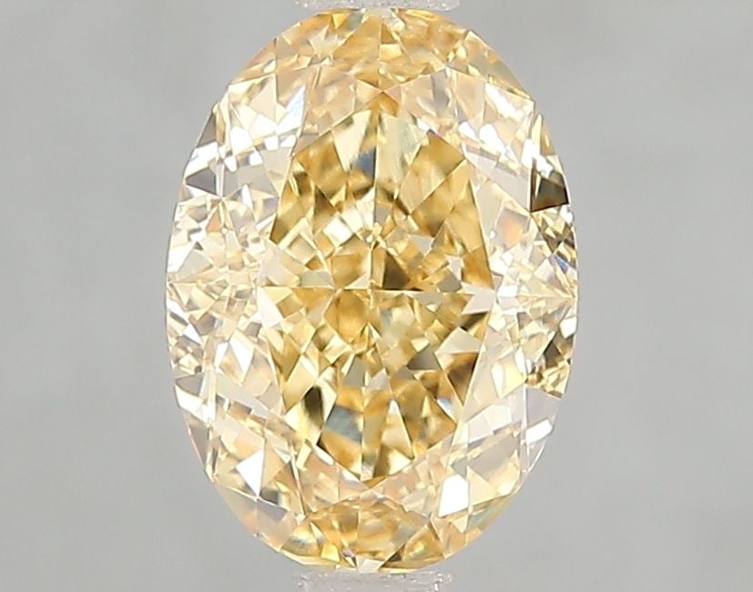 Loose Diamond - OVAL 2.02ct Fancy Vivid Yellow VVS2: Loose Diamond - OVAL 2.02ct Fancy Vivid Yellow VVS2 Source: This is a real non-mined Diamond that has been grown in a lab Shape: OVAL Carats: 2.02 Color: Fancy Vivid Yellow Certification: IGI Video: