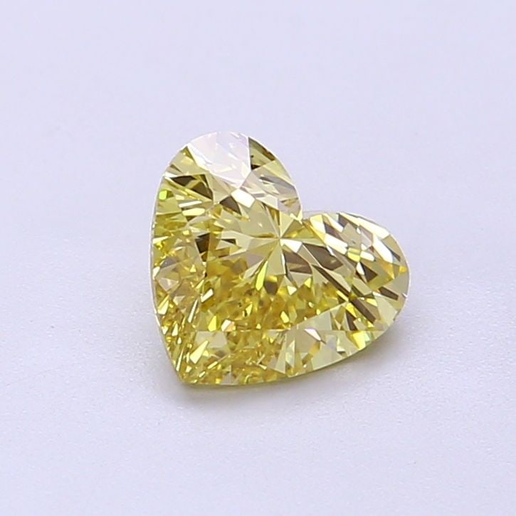 Loose Diamond - HEART 0.9ct Fancy Intense Yellow VS1: Loose Diamond - HEART 0.9ct Fancy Intense Yellow VS1 Source: This is a real non-mined Diamond that has been grown in a lab Shape: HEART Carats: 0.9 Color: Fancy Intense Yellow Certification: IGI Video