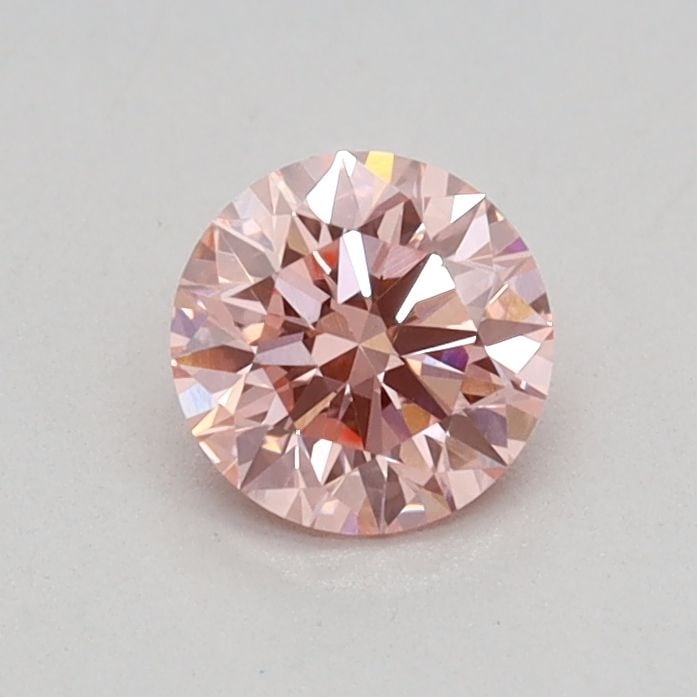 Ideal Loose Diamond - ROUND 0.36ct Fancy Vivid Pink VS1: Ideal Loose Diamond - ROUND 0.36ct Fancy Vivid Pink VS1 Source: This is a real non-mined Diamond that has been grown in a lab Shape: ROUND Carats: 0.36 Color: Fancy Vivid Pink Certification: IGI Video