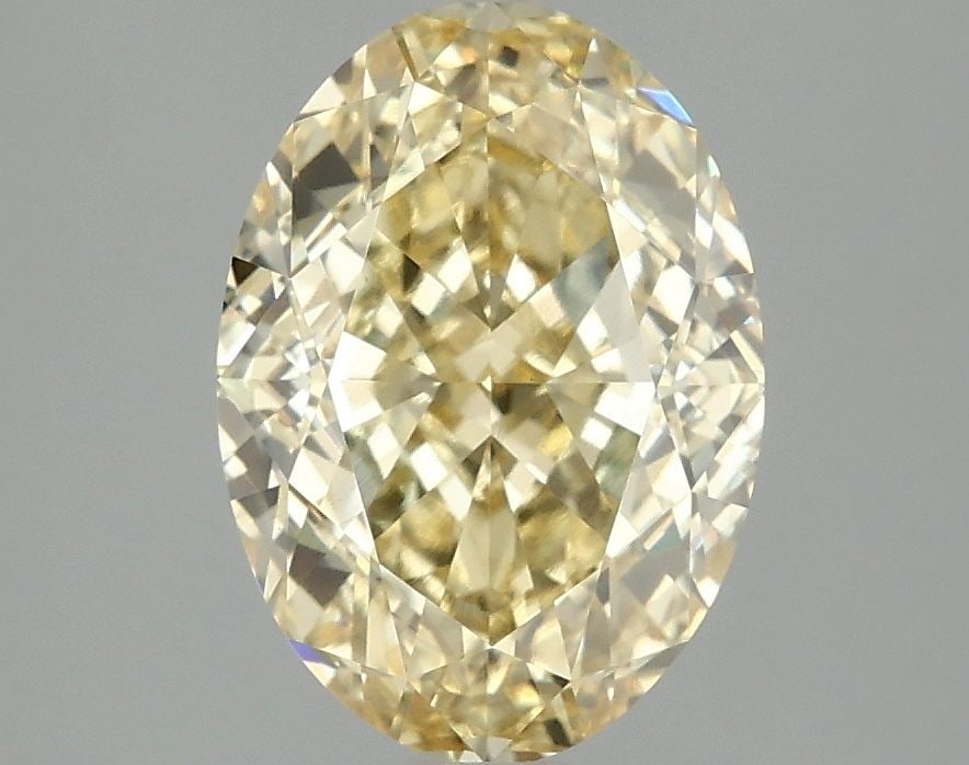 Loose Diamond - OVAL 3.1ct Fancy Vivid Yellow VS1: Loose Diamond - OVAL 3.1ct Fancy Vivid Yellow VS1 Source: This is a real non-mined Diamond that has been grown in a lab Shape: OVAL Carats: 3.1 Color: Fancy Vivid Yellow Certification: IGI Video: