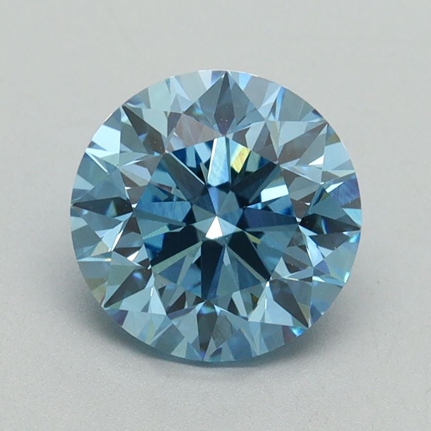 Loose Diamond - ROUND 1.73ct Fancy Vivid Blue VVS2: Loose Diamond - ROUND 1.73ct Fancy Vivid Blue VVS2 Source: This is a real non-mined Diamond that has been grown in a lab Shape: ROUND Carats: 1.73 Color: Fancy Vivid Blue Certification: IGI Video: