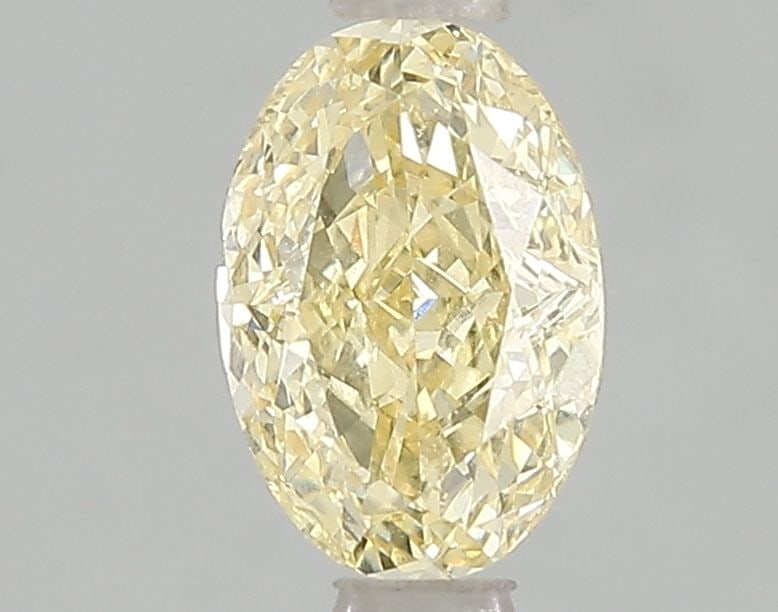 Loose Diamond - OVAL 1.09ct Fancy Intense Yellow VS1: Loose Diamond - OVAL 1.09ct Fancy Intense Yellow VS1 Source: This is a real non-mined Diamond that has been grown in a lab Shape: OVAL Carats: 1.09 Color: Fancy Intense Yellow Certification: IGI Video