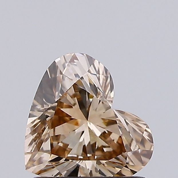 Loose Diamond - HEART 0.79ct Fancy Light Brown VS1: Loose Diamond - HEART 0.79ct Fancy Light Brown VS1 Source: This is a real non-mined Diamond that has been grown in a lab Shape: HEART Carats: 0.79 Color: Fancy Light Brown Certification: IGI Video: