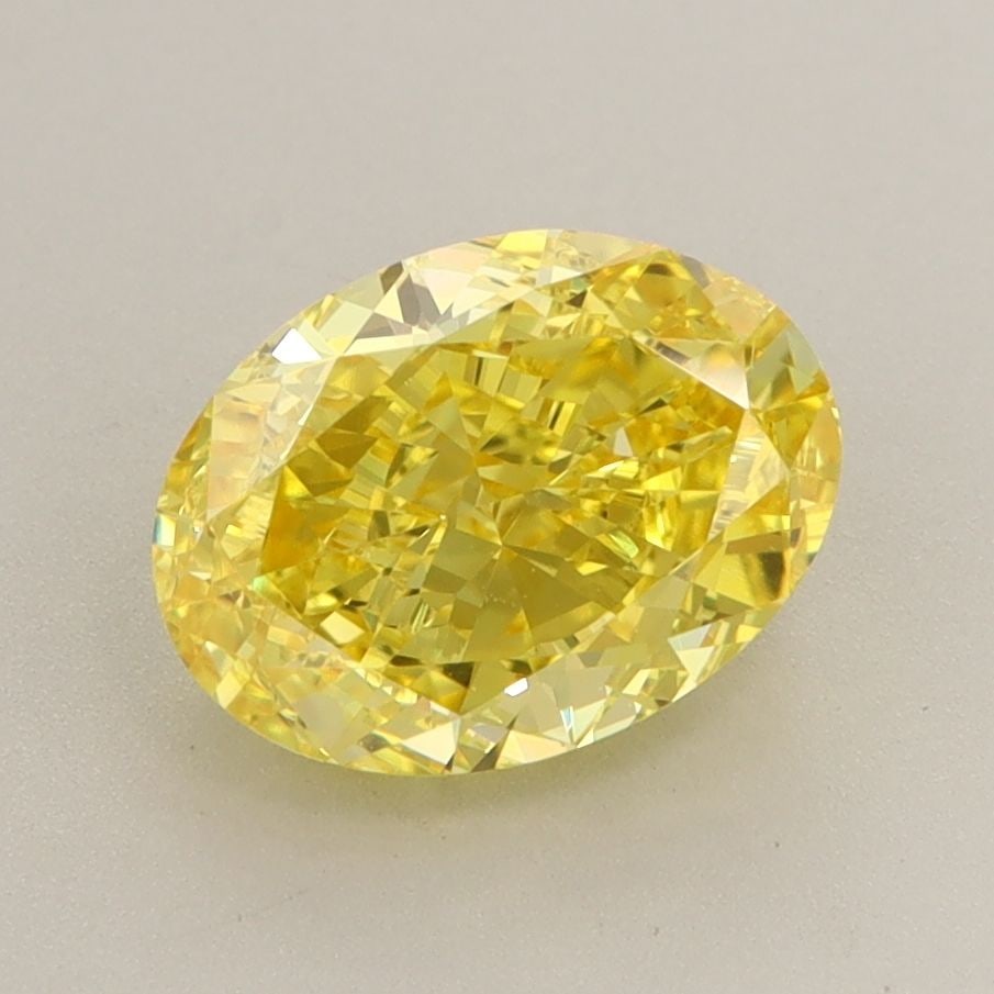 Loose Diamond - OVAL 2.2ct Fancy Vivid Yellow VVS2: Loose Diamond - OVAL 2.2ct Fancy Vivid Yellow VVS2 Source: This is a real non-mined Diamond that has been grown in a lab Shape: OVAL Carats: 2.2 Color: Fancy Vivid Yellow Certification: IGI Video: