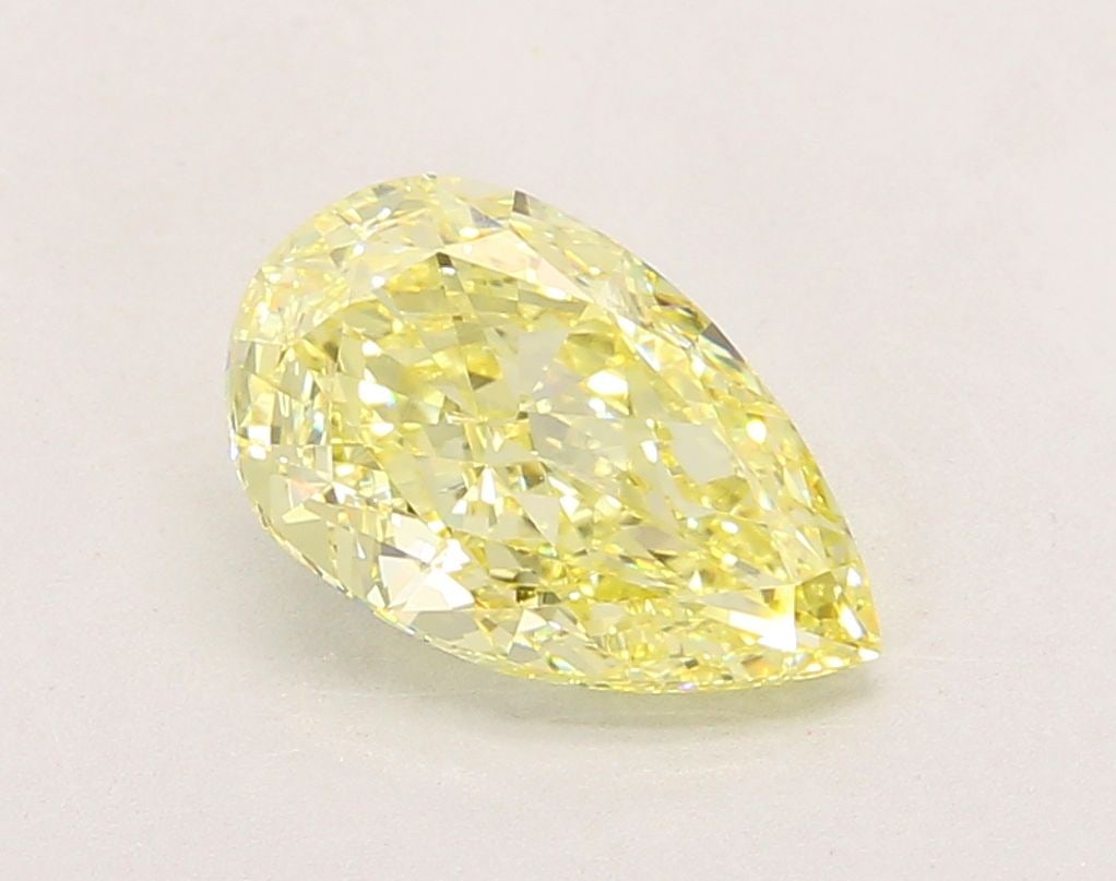 Loose Diamond - PEAR 2.43ct Fancy Yellow VVS2: Loose Diamond - PEAR 2.43ct Fancy Yellow VVS2 Source: This is a real non-mined Diamond that has been grown in a lab Shape: PEAR Carats: 2.43 Color: Fancy Yellow Certification: IGI Video: