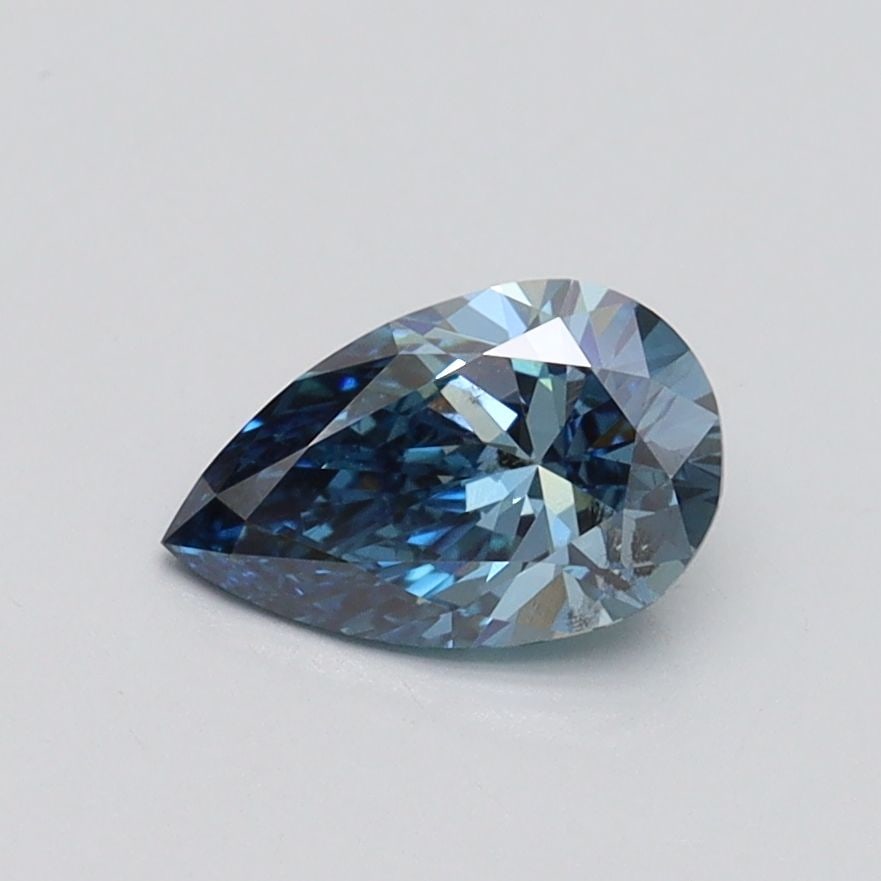 Loose Diamond - PEAR 0.7ct Fancy Vivid Blue SI1: Loose Diamond - PEAR 0.7ct Fancy Vivid Blue SI1 Source: This is a real non-mined Diamond that has been grown in a lab Shape: PEAR Carats: 0.7 Color: Fancy Vivid Blue Certification: IGI Video:
