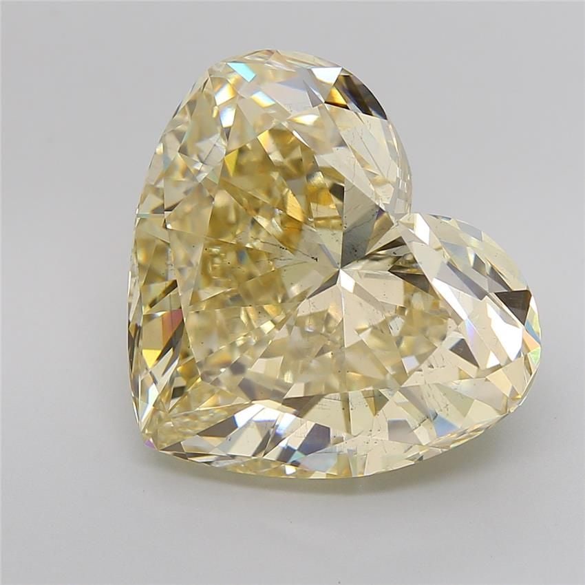 Loose Diamond - HEART 12.54ct Fancy Brownish Yellow SI1: Loose Diamond - HEART 12.54ct Fancy Brownish Yellow SI1 Source: This is a real non-mined Diamond that has been grown in a lab Shape: HEART Carats: 12.54 Color: Fancy Brownish Yellow Certification: IGI