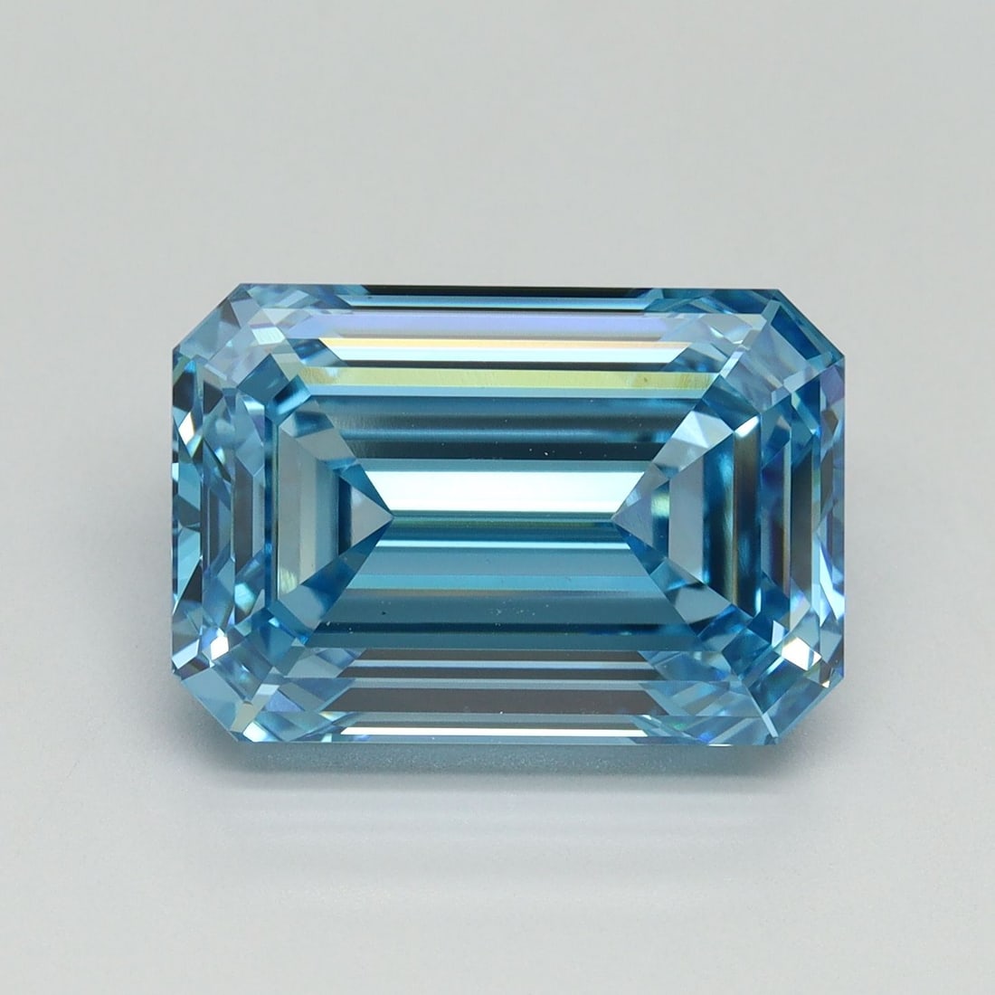 Loose Diamond - EMERALD 7.09ct Fancy Vivid Blue VS1: Loose Diamond - EMERALD 7.09ct Fancy Vivid Blue VS1 Source: This is a real non-mined Diamond that has been grown in a lab Shape: EMERALD Carats: 7.09 Color: Fancy Vivid Blue Certification: IGI Video: