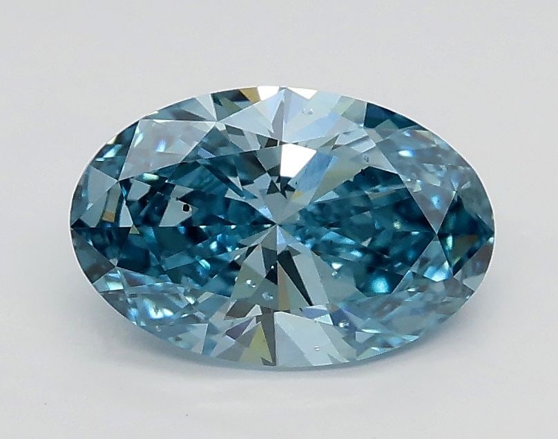 Loose Diamond - OVAL 1.01ct Fancy Vivid Blue SI1: Loose Diamond - OVAL 1.01ct Fancy Vivid Blue SI1 Source: This is a real non-mined Diamond that has been grown in a lab Shape: OVAL Carats: 1.01 Color: Fancy Vivid Blue Certification: IGI Video: