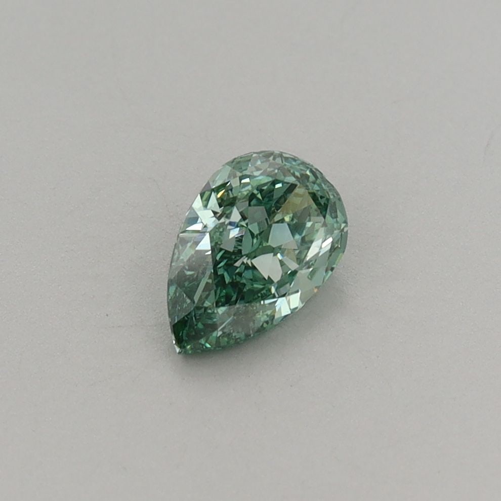 Loose Diamond - PEAR 0.52ct Fancy Vivid Green VS1: Loose Diamond - PEAR 0.52ct Fancy Vivid Green VS1 Source: This is a real non-mined Diamond that has been grown in a lab Shape: PEAR Carats: 0.52 Color: Fancy Vivid Green Certification: IGI Video: