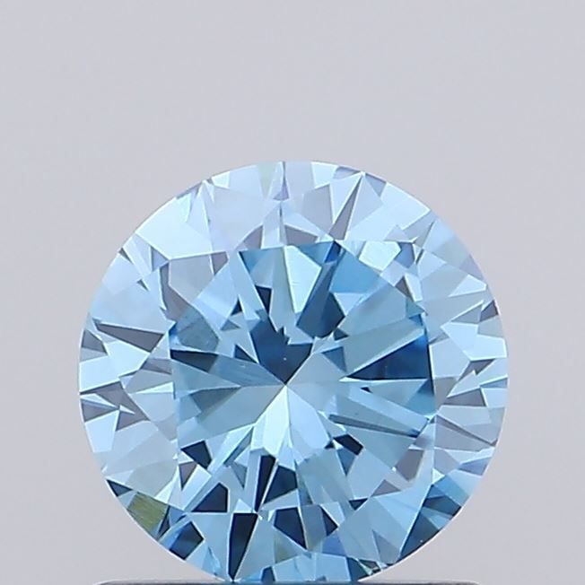 Loose Diamond - ROUND 0.83ct Fancy Vivid Blue VVS2: Loose Diamond - ROUND 0.83ct Fancy Vivid Blue VVS2 Source: This is a real non-mined Diamond that has been grown in a lab Shape: ROUND Carats: 0.83 Color: Fancy Vivid Blue Certification: IGI Video: