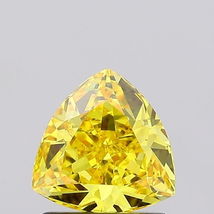 Loose Diamond - TRILLIANT 1.09ct Fancy Vivid Yellow VS1: Loose Diamond - TRILLIANT 1.09ct Fancy Vivid Yellow VS1 Source: This is a real non-mined Diamond that has been grown in a lab Shape: TRILLIANT Carats: 1.09 Color: Fancy Vivid Yellow Certification: IGI