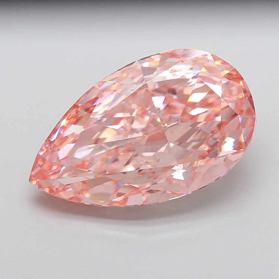 Loose Diamond - PEAR 22.11ct Fancy Vivid Pink VS1: Loose Diamond - PEAR 22.11ct Fancy Vivid Pink VS1 Source: This is a real non-mined Diamond that has been grown in a lab Shape: PEAR Carats: 22.11 Color: Fancy Vivid Pink Certification: IGI Video: