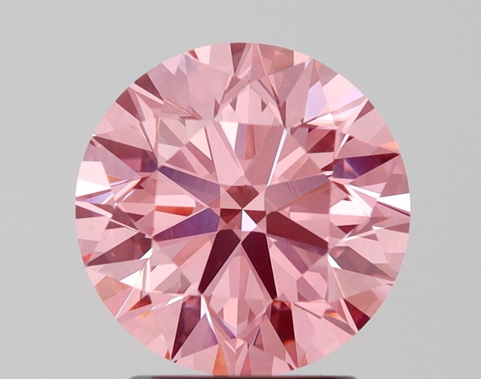 Loose Diamond - ROUND 2.0ct Fancy Vivid Pink VS1: Loose Diamond - ROUND 2.0ct Fancy Vivid Pink VS1 Source: This is a real non-mined Diamond that has been grown in a lab Shape: ROUND Carats: 2.0 Color: Fancy Vivid Pink Certification: IGI Video: