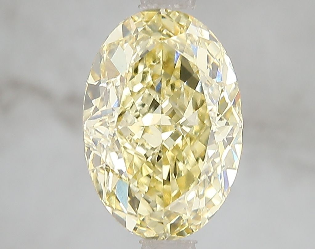 Loose Diamond - OVAL 3.08ct Fancy Intense Yellow VS2: Loose Diamond - OVAL 3.08ct Fancy Intense Yellow VS2 Source: This is a real non-mined Diamond that has been grown in a lab Shape: OVAL Carats: 3.08 Color: Fancy Intense Yellow Certification: IGI Video